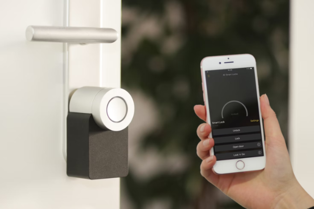 A smart phone unlocking a smart lock.